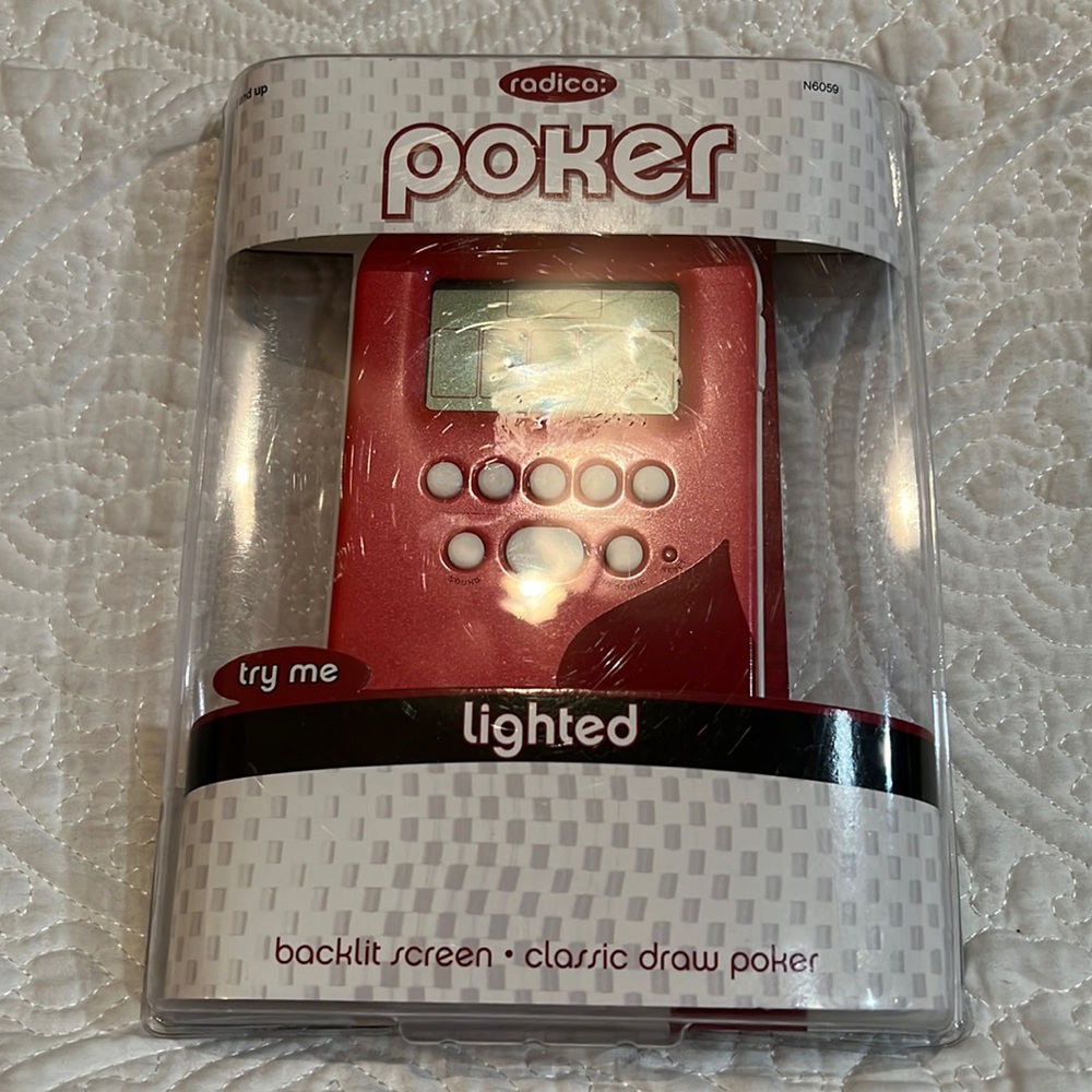 Radica poker lighted game, new in package‎